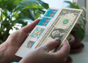 Is it possible to attach money to a letter instead of a stamp, and get it delivered?